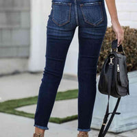Buttoned Distressed Skinny Jeans